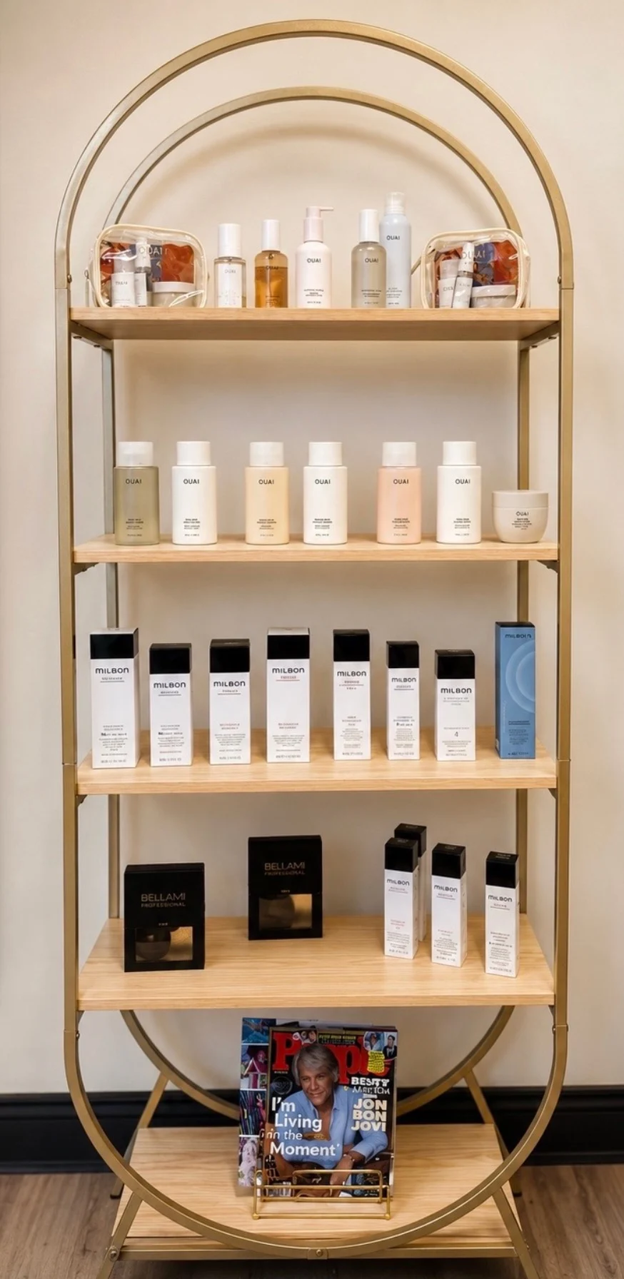 Curated retail shelf — OUAI, Milbon and BELLAMI at Edit Hair Salon