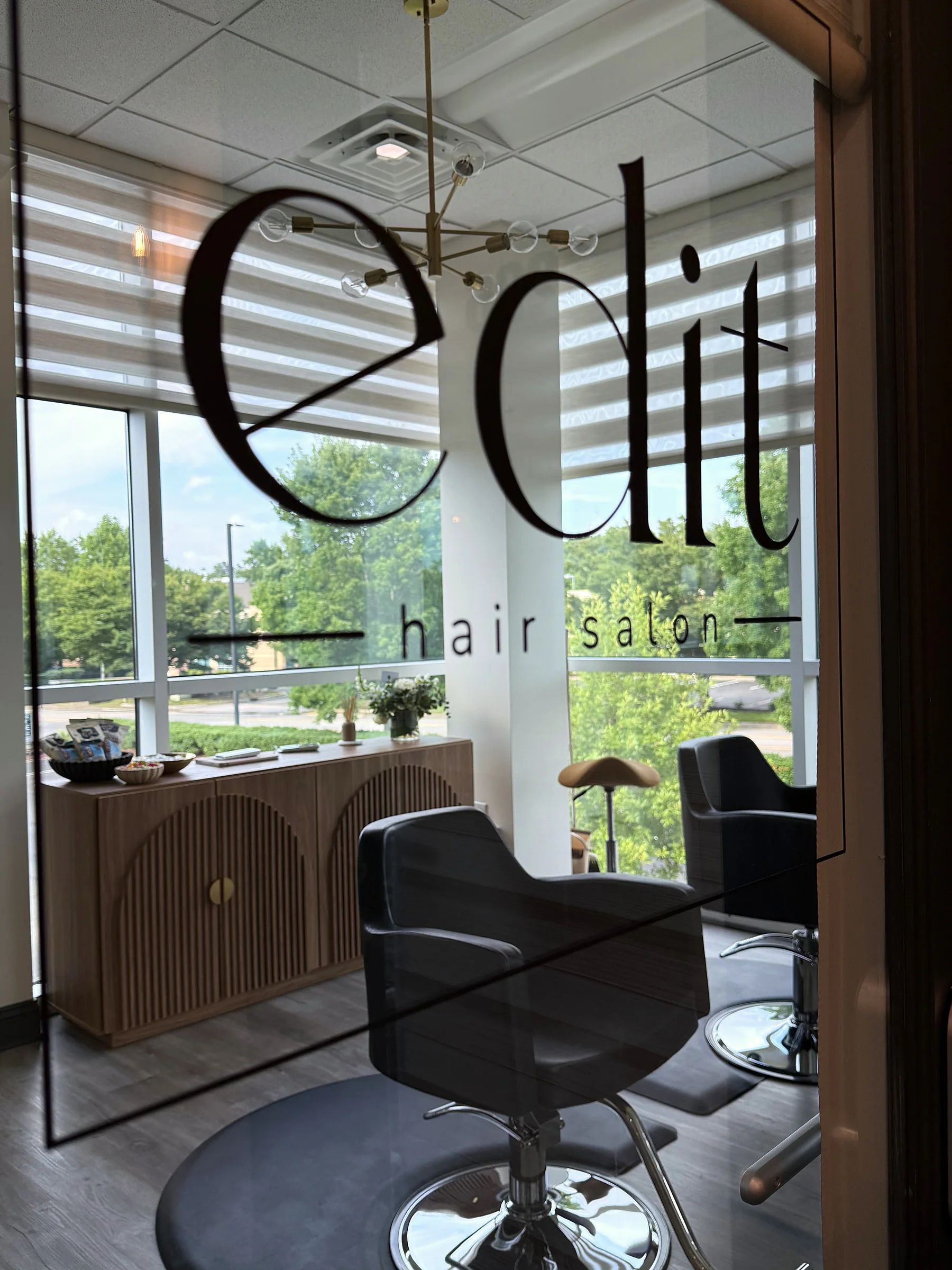 The etched-glass entrance to Edit Hair Salon